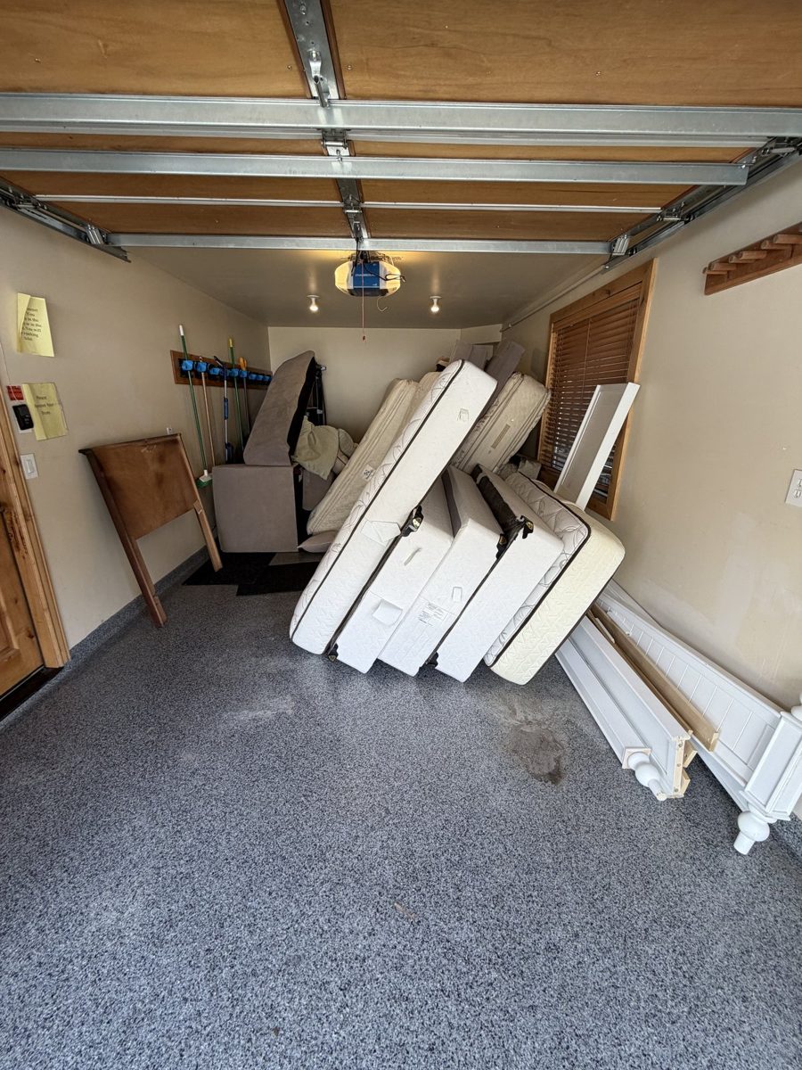 Garage full of debris before removal